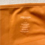 Girlfriend Collective High-Rise Biker Shorts in Caramel Photo 6