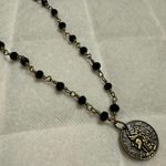 Raw and Rebellious Necklace Photo 0