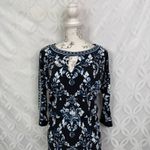 White House | Black Market Peek A Boo Sleeve Floral Tunic Top Size XS Photo 4