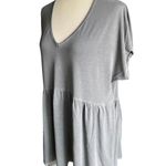 Torrid Super soft babydoll top, short sleeves, v neck, lots of stretch, excellent condition, size 1x Measurements: Bust: armpit to armpit 25 inches Length: shoulder seam to bottom 29 inches Photo 4