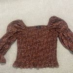 I.N. San Francisco  Floral Smocked Top in Brown Photo 7