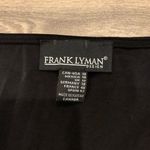 Frank Lyman Design tank style top. Size: 10. Faux leather around the straps. Black Photo 1