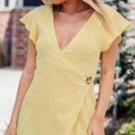 Stella Rae's Yellow wrap dress  Photo 0