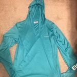 Columbia Women’s Hooded  teal long sleeve shirt Photo 0