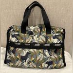 LeSportsac Boston bag jungle/safari-themed print. Weekender Crossbody Bag Photo 0