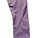 Lululemon Lavender color cropped leggings, inner waistband pocket, excellent condition, size 4 Measurements: Waist: side to side 12-14 inches Inseam: 20 inches Photo 4