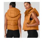 Alo Yoga ALO gold rush puffer vest size medium Photo 1
