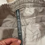 Vuori  Vintage Ripstop Mid Rise Raw Hem Ankle Pant in Light Pink Photo 3