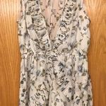 Dainty Hooligan Low-cut Floral Romper Photo 0