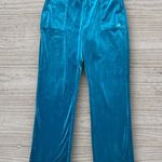Juicy Couture ā
Y2K Velour Blue Track Pants ā
Photo 1