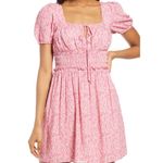 WAYF Floral Dress Size S  New Reg $90.  The dress features a dainty floral print and a fitted waist that is so flattering and fun to wear.   Fit: Fitted at waist  Closure: back zipper 100% rayon, polyester Photo 1