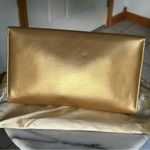 Pandora Gold tone clutch Photo 3