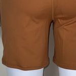 We Wore What ‎ Nylon Biker Short in Gold Photo 10