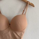 SKIMS  Ultimate Body Butt & Hip Enhancing Mid-Thigh Bodysuit in Clay, size small Photo 1