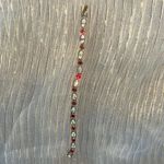 Red and White with gold bracelet filled with Rhinestones Photo 1