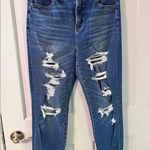 American Eagle  Ultra High-Rise Super Skinny Ripped Denim Blue Jeans Photo 1