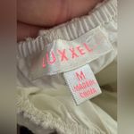 Luxxel Luxxer White Eyelet Ruffle Cotton Cut Out Accent Tie Back Shorts Romper Size M Photo 6