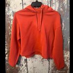 Uniqlo NWOT orange crop hoodie, size Medium Photo 0