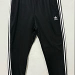 Adidas  unisex Black Joggers with White Stripes Photo 0