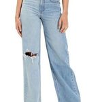 American Eagle  | Ripped Distressed Super High-Waisted Baggy Wide-Leg Jean | 8 Photo 0