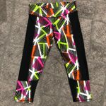 Fabletics tribal penzy print capri legging jogger in neon orange, pink and green Photo 1
