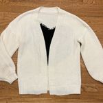 White Cardigan Sweater with Black Heart Design Photo 1
