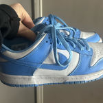Nike Selling blue and white  dunks they are barely used. No creases in them very fairly new  Photo 0