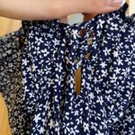 Windsor COPY - Navy blue bodycon dress with white flowers. Short, fits mid-thigh. Photo 1