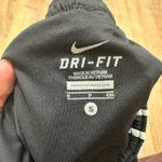 Nike | Tempo Dri-FIT Women's Athletic Performance Mid-Rise Running Shorts Photo 5