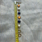 Multicolor bracelet orange, blue and white with gold Photo 3
