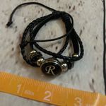 Brand new adjustable braided strappy black R bracelet Photo 1