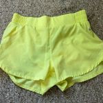 ASICS  women’s shorts yellow Photo 0