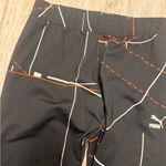 Puma  Black Leggings with Red and White Accents Photo 2