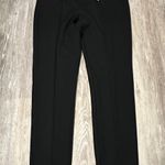 Bebe women logo leggings are a size Medium. Photo 4