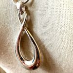 Dana Buchman silver tone infinity twist pendant necklace Photo 6