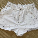 Hummingbird Boutique Silver and Gold Star Shorts Photo 0