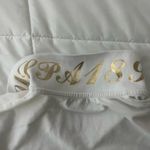 U.S. Polo Assn. Women’s White and Gold Polo Shirt Photo 3