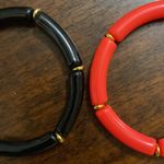 NWT Set of narrow tube stretch bracelets in black and light red. Photo 1