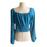 SheIn NWOT--BLUE/GREEN LONG SLEEVE CROP TOP-SIZE LARGE Beautiful crop top, color is a blue green color, puff long sleeves, smocked bottom, 80% polyester and 29% cotton, excellent condition, size large Measurements: Bust: armpit to armpit 19-20 inches Length: shoulder seam to bottom 17 inches Photo 4