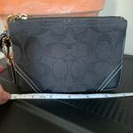 Coach signature canvas wristlet with contrast stitching EUC brass hardware Photo 2