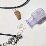 Hand crafted natural crystal clear quartz in mini bottle necklace Purple Photo 0