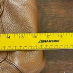 Tan Leather Shoulder Bag with Gold Hardware and Structured Shape Photo 7