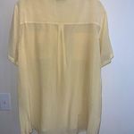 Jaclyn Smith  Light Yellow Blouse Photo 3