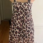 Generic Stylish leopard print swim dress with black underlay. Perfect for beach outings. Photo 5