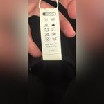 Halara  Ribbed Knit Crossover High Waisted Pocket Casual Flare Pants NWT XS Photo 9