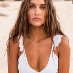 Lulus Lulu’s White Ruffle Bikini Top. Size medium. Photo 0