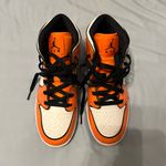 Nike Air Jordan 1 Mid Photo 1