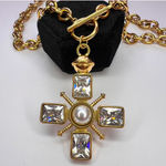 Chunky gold cross necklace with pearl and toggle clasp Photo 2