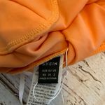 SHEIN Orange Strapless Tube Crop Top Photo 1