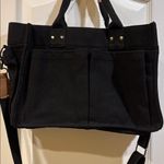 Black Canvas Tote Bag Brown Accents Detachable Strap 6 Pockets Outside on Bag Photo 0